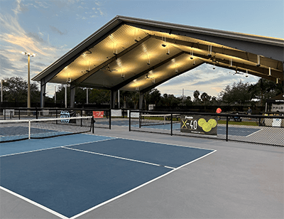 covered pickleball courts at GT BRay park at dusk