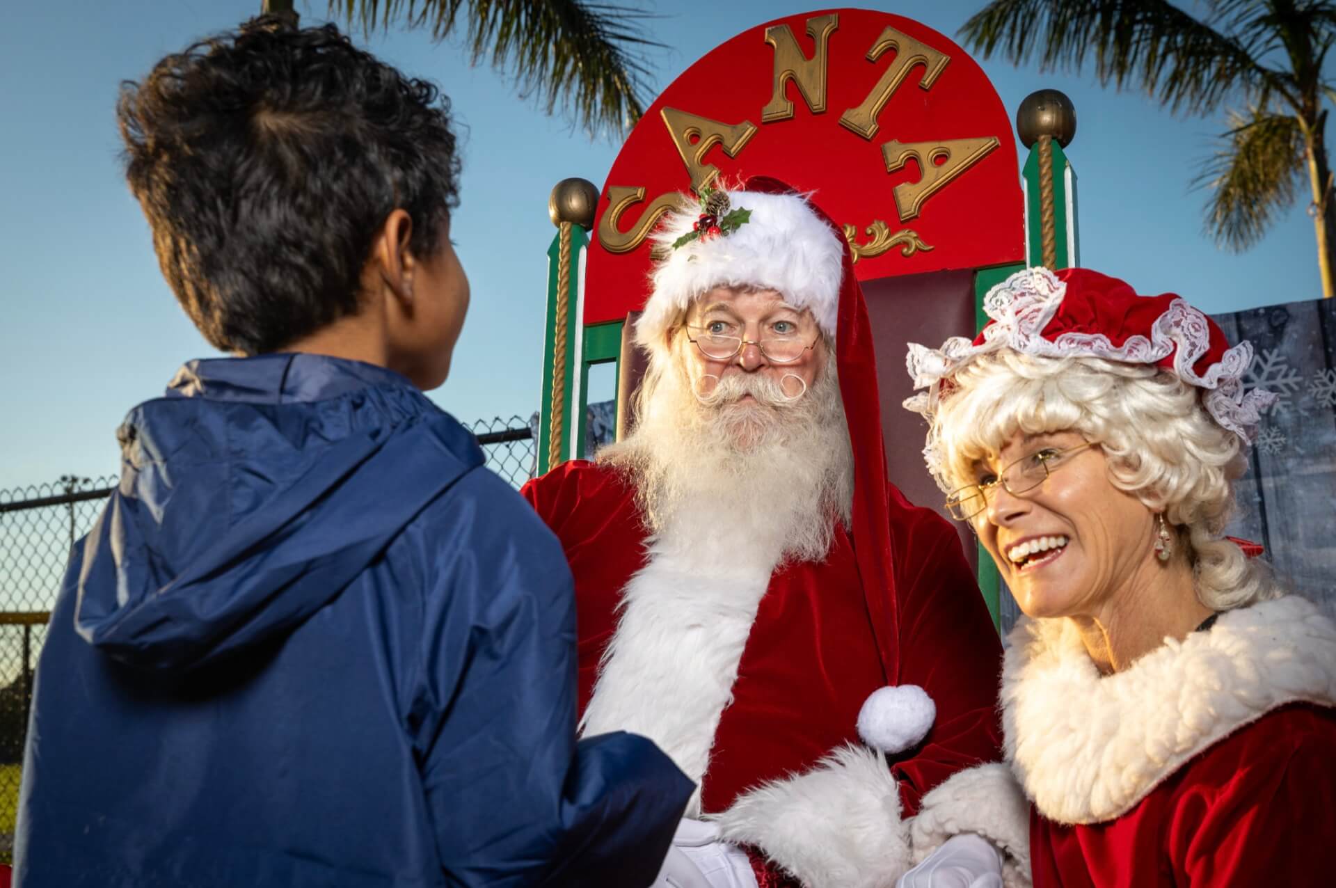 Christmas Events in the Bradenton Area Santa and Mrs. Claus with child