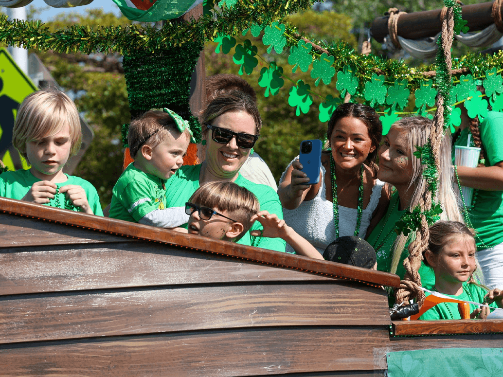 people in the parade wearing green
