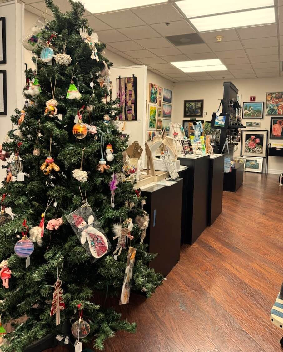 Picture of art studio with Christmas tree decoration.