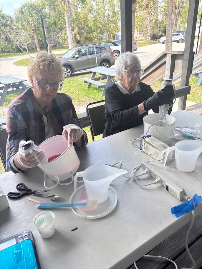 Two women making soap at the Florida Maritime Museum