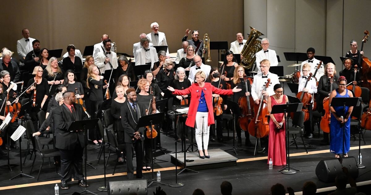 Pops Orchestra - Robyn in red coat