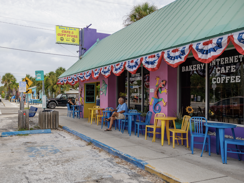 Ginny's & Jane E's colorful cafe and coastal store exterior on Anna Maria Island.