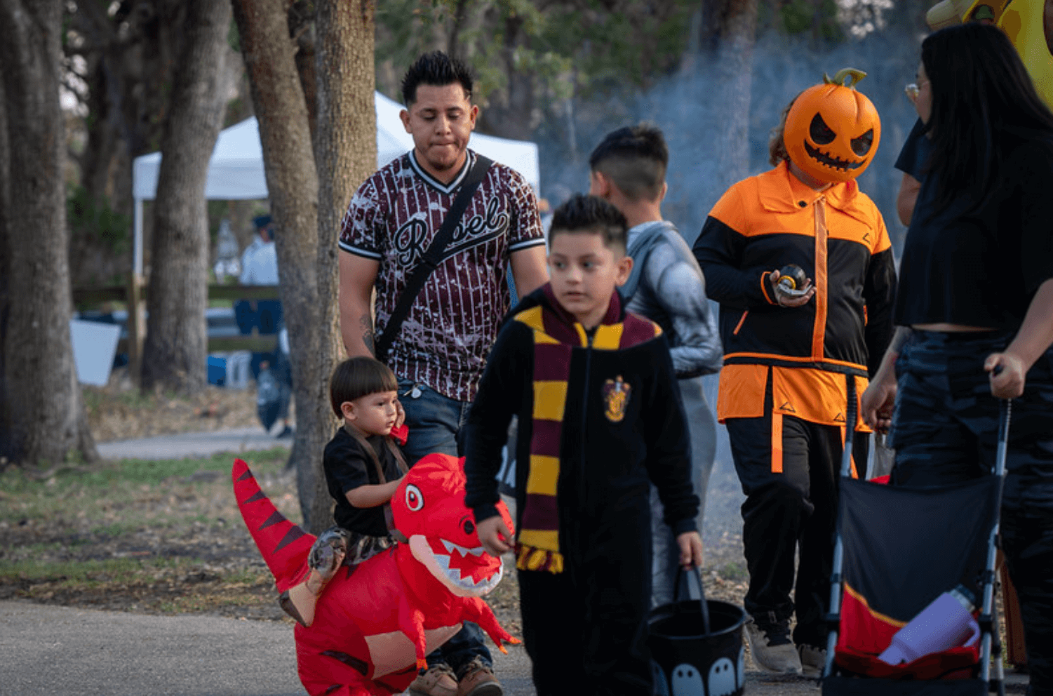 Children in costumes during Halloween event.