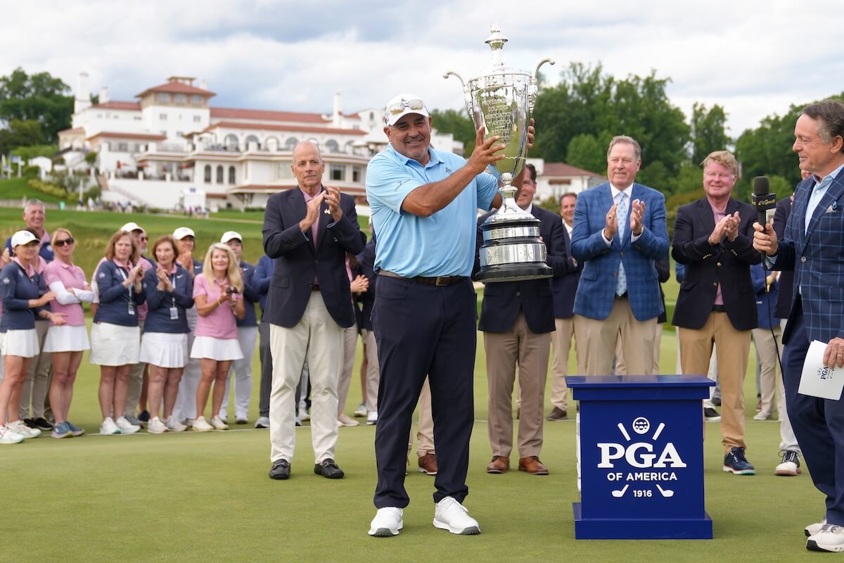 winner of the championships with his trophy
