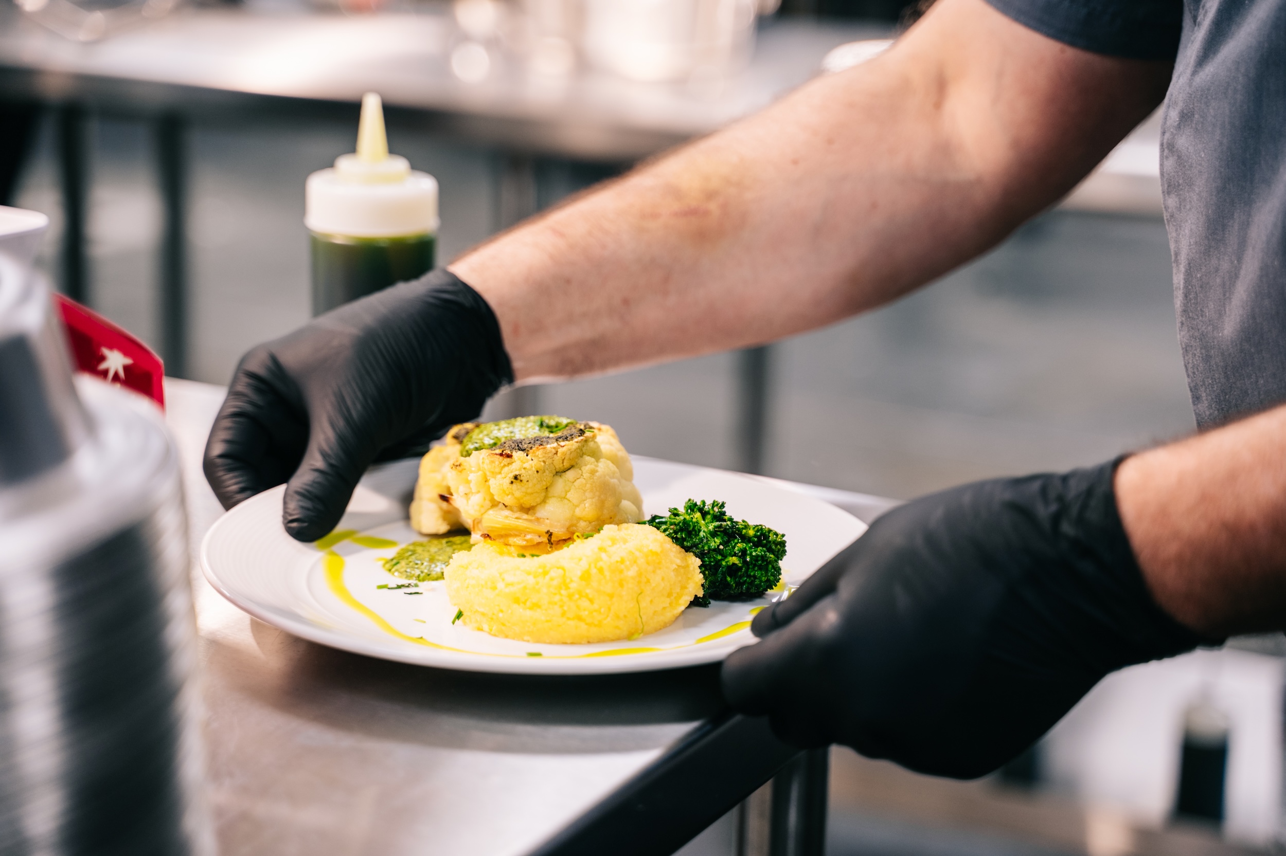 chef preparing meal in kitchen